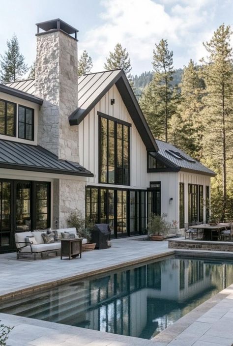 Cashmere&Pearls Lifestyle White Chalet House Exterior, Types Of Modern Houses, Modern Farmhouse Chimney Exterior, Master Bath Mountain Home, White Black Barndominium, Cream House Exterior Black Trim, Modern Roof Lines Design, Barndominium White Exterior, Houses With A Lot Of Windows