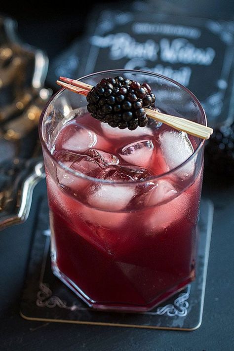 16 Easy Halloween Punches We’re Completely Obsessed With #refinery29 https://www.refinery29.com/en-us/2015/10/95204/halloween-punch-bowl-party-ideas#slide-12 Black Widow Cocktail, Halloween Punch Bowl, Easy Halloween Cocktails, Cocktail Recipes For A Crowd, Halloween Punch Recipes, Halloween Bridal Showers, Halloween Punch, Batch Cocktails, Halloween Fest