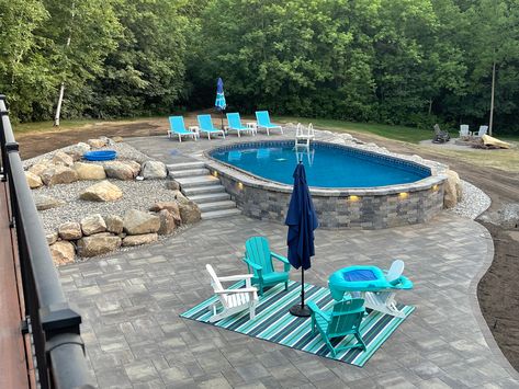 Hybrid Pool Design, Elevated Inground Pool, Above Ground Pool With Hot Tub, Backyard Oasis On A Budget Pools, Oval Pool Landscaping Ideas, Above Ground Pool Built Into Hill, Semi Inground Pool Ideas Decks, Above Ground Pool Surround Ideas, Inground Pool Ideas Sloped Yard