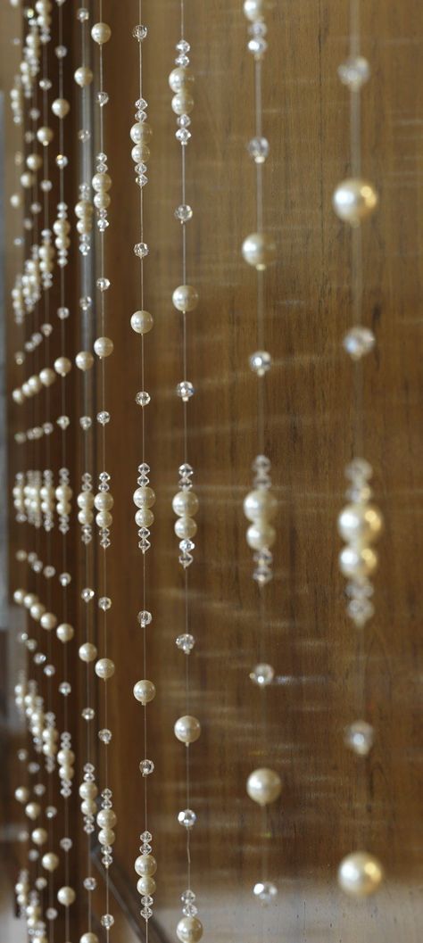 PEARL AND CRYSTAL BEADED STRANDS Pearl Beaded Curtains, Pearl House Decor, Pearl Bead Curtain, Pearl Curtains Beads, Pearls Curtains, Pearl Toran Design, Beads Curtain Ideas, How To Make A Beaded Curtain, Pearl Room Decor