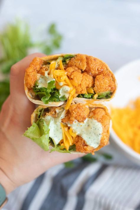 Buffalo Cauliflower Wraps - The Hangry Economist Cauliflower Wraps Recipe, Buffalo Cauliflower Wraps, Mushroom Wrap, Cauliflower Wraps, Sweet Potato Vegetarian, Cilantro Ranch, Sweet Potato Quesadilla, Buffalo Chicken Wraps, Meat Replacement