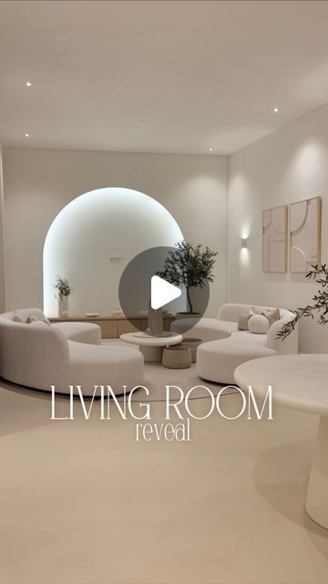 Armine Isajan on Instagram: "LIVING ROOM REVEAL 🕊️🥺 For the living room we wanted to create a big open space with a lot of calmness & comfort 🤍 We don’t like watch tv but if we watch movies we use our beamer & project it on our custom cinewall @caminoflames 🎬🫶🏽 Round “cinewall” @caminoflames Wall art @studio.lde Curtains + carpet @a_floors_ Wooden cabinet @maatkastenonline.be Couches @richmondinteriors Table @richmondinteriors Olive tree @bloomboutique.nl Set of 3 vases @purovivere Pillows @maisonmanon Cast floor @behaaglijkwonen Mirrors are @glassfactory_fi @lasitehdas   But @studioyba custom made the white frames how beautiful ?! 🥺🤍 #livingroom #livingroomdecor #japandi #japandistyle #japandiinterior #house #home #houserenovation #interieur #interior #interiordesign #arch Japandi Living Room Tv Wall, Arch Tv Cabinet, Arch Tv Wall, Japandi Tv Cabinet, Japandi Tv Wall, Tv Area Ideas Living Room, Rooms Inspiration, Television Wall, Round Carpet Living Room