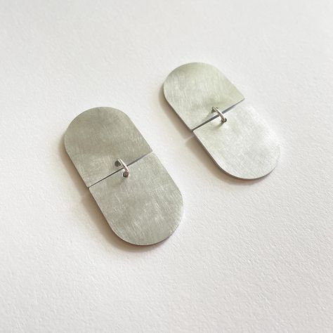 Simple silver aluminium earrings from our Cousins collection. A series of pieces exploring matching and opposing geometry. I am so happy to be back working on jewellery and so thrilled that you also seem to like it. . #modernjewellery #contemporaryjewellery #geometricjewellery #handcrafted #smallbatch #shoplocal #shopsmall #shopsmallbusiness Minimalist Metal Earrings With Oxidized Finish, Minimalist Brass Earrings With Oxidized Finish, Anodised Aluminium Jewellery, Adjustable Minimalist Geometric Earrings, Modern Geometric Nickel-free Earrings, Aluminum Earrings, Shop Small Business, Contemporary Jewellery, Small Shop