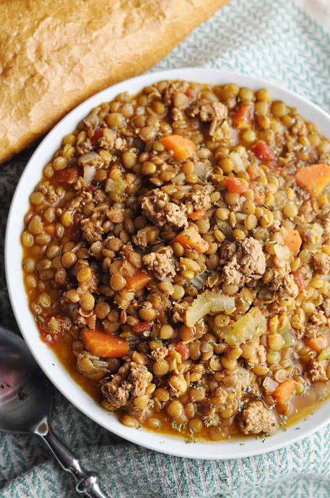 Lentil soup with ground turkey served with bread Macro Friendly Lentil Soup, Lentil Recipes For Diabetics, Lentil Turkey Soup, Lentil And Ground Turkey Recipes, Ground Turkey Lentil Recipes, Ground Turkey Lentil Soup, Ground Turkey And Lentils Recipes, Turkey And Lentil Soup, Ground Turkey Soup Recipes