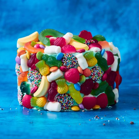 Turn heads with this fun and colourful lolly cake. This simple cake hack delivers above and beyond in terms of flavour, ease and wow-factor. Woolworths Cake, Woolworths Cakes, Lolly Cake, Cake Hacks, Peppermint Christmas, Simple Cake, Food Log, Party Mix, Vanilla Frosting