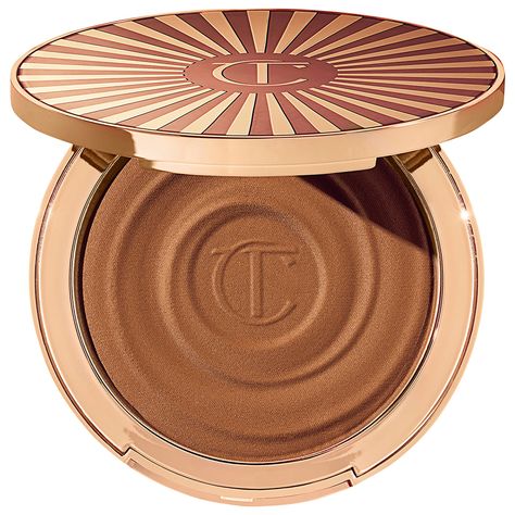 A 16-hour wear cream bronzer in 4 beautiful sun-kissed shades for face and body that blurs skin, hydrates with hyaluronic acid, and is sweatproof.Coverage: MediumFinish: NaturalFormulation: CreamHighlighted Ingredients: - Hyaluronic Acid: Hydrates and visibly revitalizes skin. - Vitamin D3: Helps protect skin upon exposure to sunlight. Best Charlotte Tilbury Products, Charlotte Tilbury Beautiful Skin, فنسنت فان جوخ, Cream Bronzer, Charlotte Tilbury Makeup, Body Creams, Makeup Needs, Summer Glow, Makeup Items