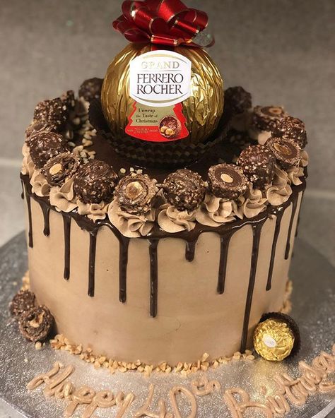 new style ferrero rocher cake😻🍫 - - #cake #cakesofinstagram #cakeinspo #cakeinspiration #wiltoncake #dripcake #newyork #buttercream #piping… Rocher Cake, Ferrero Rocher Cake, Buttercream Piping, Cake Mini, Hazelnut Cake, Birthday Cake Chocolate, Orange Cake, Ferrero Rocher, Cake Designs Birthday