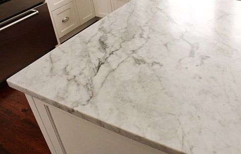 Comparing Carrara Marble Countertops to Other Types of Marble Carrera Marble Kitchen, Carrara Marble Countertops, Carrara Marble Kitchen, Carrera Marble Countertops, Types Of Marble, Cleaning Marble, Marble Tile Backsplash, Marble Countertops Kitchen, Carrara Marble Countertop