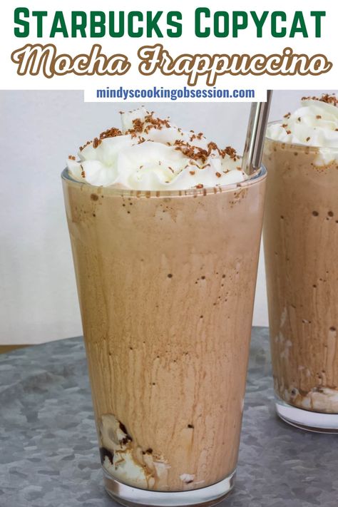 Making a Starbucks Frappuccino at home has never been easier with our easy and delicious recipe. Instant coffee granules, milk, chocolate sauce and ice are blended together and then topped with whipped cream and shaved chocolate. It's the perfect frozen coffee drink, especially on hot days! via @mindyscookingobsession Blended Mocha Coffee Recipe, Instant Coffee Frappuccino, Frozen Whipped Coffee Recipe, Blender Coffee Recipes, Ninja Creami Coffee Drinks, Espresso Powder Recipes Coffee, Frozen Whipped Coffee, Scooters Coffee Drinks Recipe, Frozen Mocha Coffee Recipe