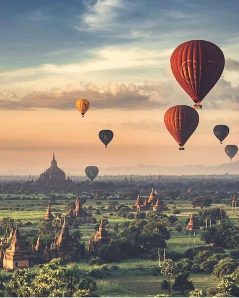 Traveling Bagan in Myanmar #myanmar #burma #southeastasia #travel #travelagency #traveldeals #travelling #travelwebsites #vacations #cheaptravel #besttravelwebsites #trip #mytrips #planmytrip #solotravel #travellingalone #bestplacestotravel #solotrip #solofemaletravel #travelers #mustvisit #temple #bagan Station Essence, Bagan Myanmar, World Images, Destination Voyage, Hot Air Balloons, Bagan, Air Balloons, Travel Insurance, Wonderful Places