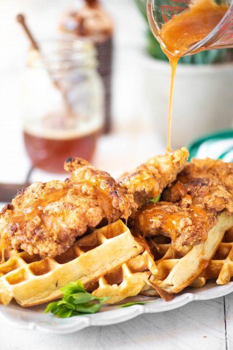 Have you ever had chicken and waffles? This brunch staple is crispy outside, tender inside and topped with a drizzle of irresistible sriracha honey! Somehow I made it to the age of 32 before I ever had chicken and waffles. I'm assuming that this is something that originated in the southern half of the U.S., because I can tell you with all certainty that I'd never heard of the concept until a couple of years ago. Truth time- I thought it was super weird. Waffles belong with syrup. Why are we ... Fried Chicken Sides Dishes Ideas, Chicken And Waffles Recipe Easy, Chicken Waffles Recipe, Honey Sriracha Sauce, Boiled Chicken Breast, Weekend Food, Fried Chicken And Waffles, Soul Kitchen, Savoury Recipes