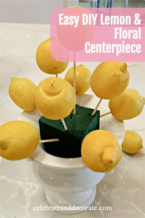 lemon centerpiece in process of being made with text overlay easy diy lemon and floral centerpiece Lemon And Orange Centerpieces, Lemon And Hydrangea Centerpiece, Lemon Table Setting Ideas, Lemon Flower Arrangements, Lemon Centerpiece Ideas, Lemon Themed Bridal Shower Ideas, Fruit Centerpieces Wedding, Amalfi Theme, Simple Table Centerpieces