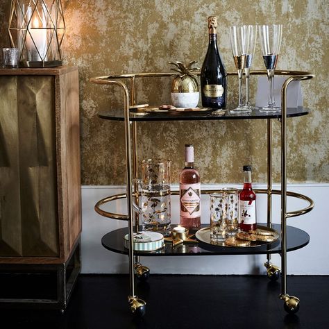 With Christmas and New Year coming up, it’s time to crack open the bubbly and dig out the cocktail shaker. Rather than routing around every time someone wants a drink, why not take inspiration from our bar ideas and create your own drinks station this party season? #cocktailbars #partyideas #christmaspartyinspiration #impressivepartyideas Beverage Stations, Beverage Station Party, Cocktail Trolley, Christmas Party Drinks, Cocktail Station, Drink Display, Alcohol Bar, Home Cocktail Bar, Bar Inspiration