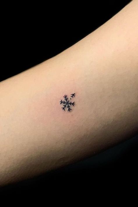 25 Snowflake Tattoo Ideas: Channeling the Beauty of Winter's Delicacy Summer Winter Tattoo, Minimalist Snowflake Tattoo, Winter Tattoos For Women, Small Christmas Tattoos, Snow Flakes Tattoo, Snow Tattoo Ideas, Christmas Tattoo Small, Enjoy The Journey Tattoo, First Love Tattoos