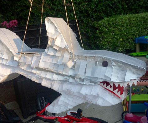 Piñata Made From Cardboard : I love piñatas, they're so much fun!With my nephew's 7th birthday approaching I was trying to decide what gift I could make for him. His family loves to have piñatas at their parties, so I offered to make him one as a gift. His party was beach the... Shark Pinata, Make A Pinata, How To Make Pinata, Shark Craft, Ocean Theme Birthday, Ocean Theme Classroom, Shark Themed Birthday Party, Red Ted Art, Piñata Ideas