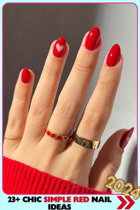 Short round nails with glossy red polish and heart accent. Chic and playful design, perfect for casual or fun occasions. Simple red nails with a cheerful and lively vibe. Short Nail Red Design, Cute Red Gel Nails, Red Nails Simple Design, Red Nails Gel Design, Short Nails Red Design, Red Nails With Heart Design, Simple Red Nail Ideas, Pretty Red Nails Acrylic, Red Short Nails Design