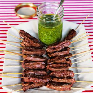 Skirt Steak Skewers with Cilantro-Garlic Sauce Recipe | MyRecipes.com Steak Appetizers, Cilantro Garlic Sauce, Steak Skewers, Grilled Skirt Steak, Garlic Sauce Recipe, Olive Oils, Steak Sauce, Skirt Steak, Snacks Für Party