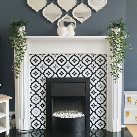 Savvy DIY-er transforms fireplace surround with self adhesive floor tiles Fireplace Moroccan Tile, Aesthetic Fireplace, Fireplace Christmas Decorations, Fireplace Aesthetic, Painting Fireplace, Painted Fireplace Mantels, Fireplace Decorating Ideas, Tile Around Fireplace, Fireplace Painting