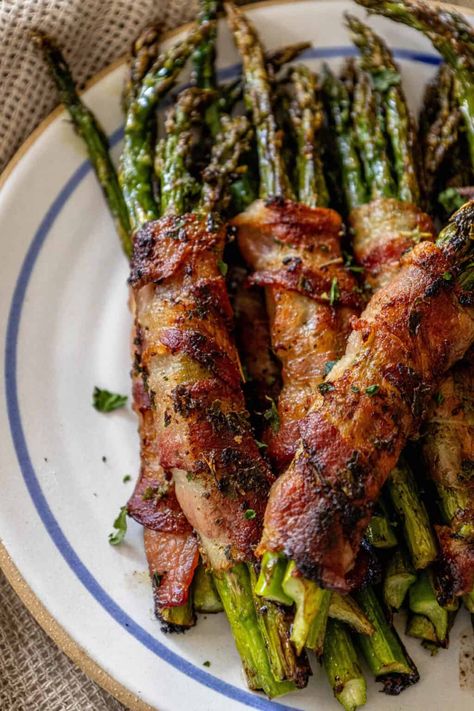 Garlic Bacon Wrapped Asparagus - side dishes #sidedishes Crock Pot Asparagus Recipes, Bacon Wrapped Asparagus On The Grill, Procuttio Wrapped Asparagus, Fancy Asparagus Recipes, Bacon Wrapped Asparagus In Oven, Asparagus Bacon Wrapped, Asparagus Wrapped In Bacon, Grilled Bacon Wrapped Asparagus, Asparagus With Bacon