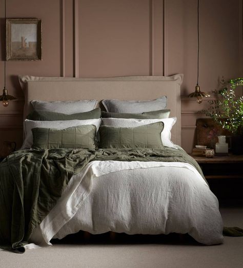 Olive Green Sid Stripe 100% Linen Duvet Cover has the most delicate tiny vertical stripes woven from certified European flax yarns in olive green and off white.Woven with care by our friends in Portugal, this stylish duvet cover is available in five UK sizes, from single to emperor, laundered for softness and then finished with pearly white recycled buttons at the foot end.  For a top-notch bedtime add a couple of matching pillowcases in the same stripe. Care guide: launder at 40 degrees.&n Green Bedding Room Ideas, Striped Bedding Bedroom, Green Bed Linen, Charcoal Bedroom, Olive Green Bedrooms, Recycled Buttons, Green Sheets, Linen Bed, Green Duvet