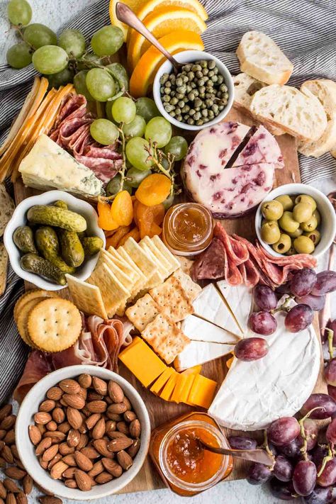 The ultimate charcuterie board loaded with cheese, meats, fruits, and other sides. A simple and quick appetizer recipe for any occasion! Quick Appetizer Recipes, Charcuterie Board Meats, Wine And Cheese Party, Appetizers For A Crowd, Charcuterie Platter, Charcuterie Cheese, Cheese Party, Charcuterie And Cheese Board, Tasting Party