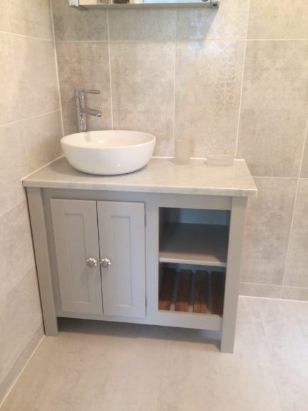 Bespoke vanity unit in pavillion grey , carrara top and solid oak slats | Aspenn Furniture Toilet And Basin Vanity Unit, Tiny Ensuite Shower Room, Tiny Ensuite, London Bathroom, Cloakroom Ideas, Toilet Vanity Unit, Under Sink Storage Unit, Ensuite Ideas, Bathroom Sink Units