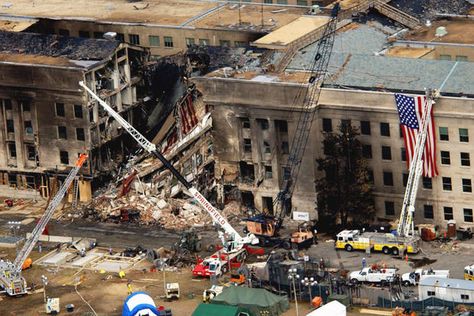 An aerial view of the damage at the Pentagon two days after Sept. 11, 2001. On that day, five members of al-Qaida, a group of fundamentalist Islamic Muslims, hijacked American Airlines Flight 77, a Boeing 757-200, from Dulles International Airport just outside Washington and flew the aircraft and its 64 passengers into the side of the Pentagon. (Tech. Sgt. Cedric H. Rudisill/U.S. Air Force photo) Into The West, Skid Row, The Pentagon, We Will Never Forget, Twin Towers, Lest We Forget, Aerial Photo, World Trade, World Trade Center