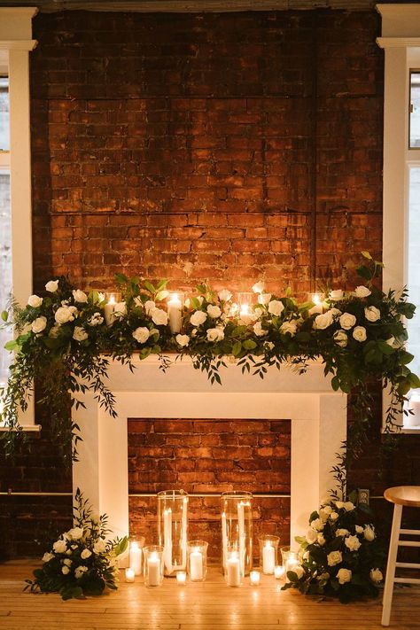 Wedding Mantle, Wedding Fireplace, Hamilton Wedding, Factory Wedding, Christmas Wedding Decorations, Wedding Alters, Niagara Wedding, Floral Installation, Candles In Fireplace