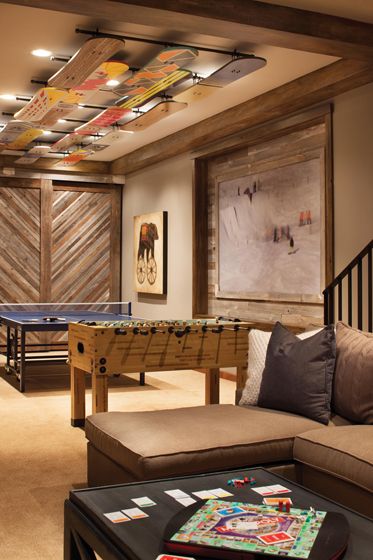 Faux snowboards adorn the ceiling of the #play #room. Interior Design by Kristin Peake. Basement Games, Acnh Basement, Hangout Room, Game Room Basement, Home Design Magazines, Game Room Family, Basement Ceiling, Basement Bedrooms, Mountain High