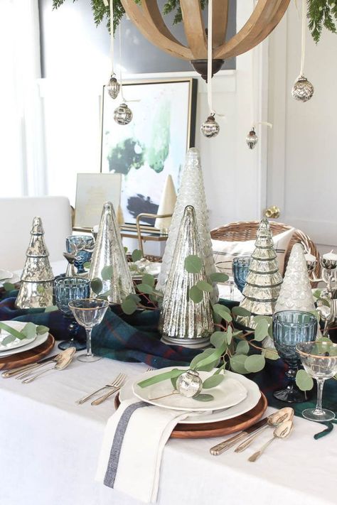 Eclectic Christmas Tablescape with mercury glass christmas trees and ornaments #tablescape #glam #luxe Blue Christmas Table Decor, Blue Christmas Table, Eclectic Christmas, Mercury Glass Christmas Tree, Christmas Dining Table, Blue Christmas Decor, Deco Table Noel, Christmas Table Decor, Mercury Glass Christmas