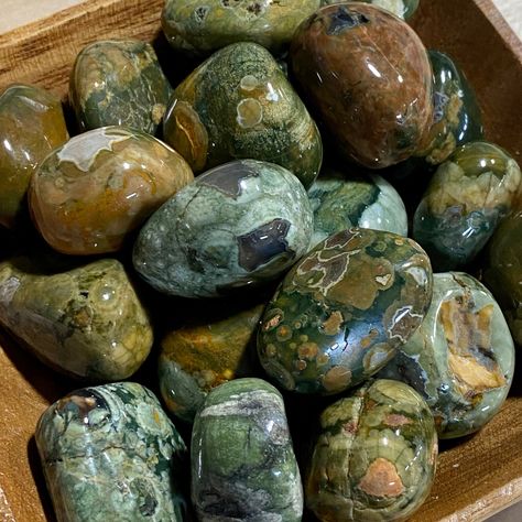 To keep our prices low, we do not send labels with our stones. If you have trouble identifying something you receive feel free to email us photos and we will assist. Thank you! You will receive one Tumbled Rhyolite. See photos for size. They are between 1 & 1.25 inches. We will handpick one stone for you. The stone will be from the batch that is pictured, however it may not be a stone from the photo as the batch was quite large. Rainforest Rhyolite (also called Rainforest Jasper, Australian Rainforest Jasper, Crystal Aesthetic, Volcanic Rock, Pretty Rocks, Cool Rocks, Crystal Magic, Love Rocks, Rock Collection, Minerals And Gemstones