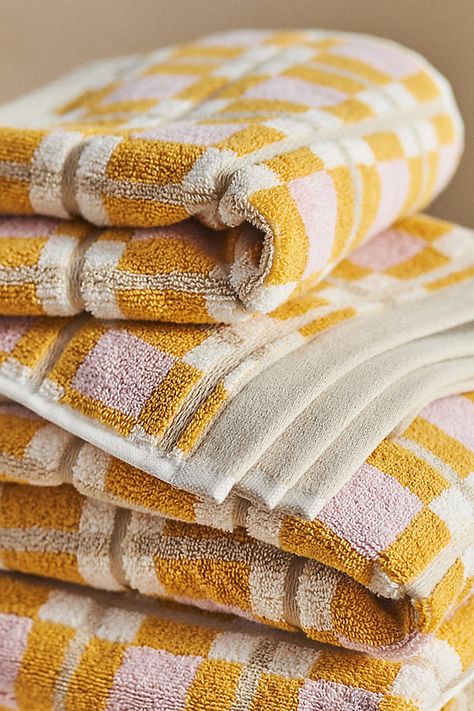 The Taryn Towel Collection embodies understated elegance and superior functionality, featuring high-quality, absorbent fabric and graphic design that effortlessly elevates the aesthetic of any bathroom. | Taryn Towel Collection by Anthropologie in Yellow, Cotton Waffle Bath Towel, Cute Bathroom Towels, Towels In Bathroom, Yellow Bathroom Ideas, Fabric Reference, Printed Towels, Bright Palette, Decorative Bath Towels, Towels Bathroom