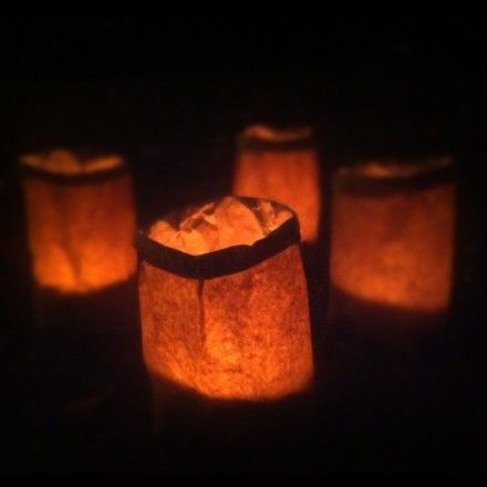 Paper Bag Luminaries · Candle Making | CraftGossip.com Paper Bag Candles, Luminaries Paper Bag, Paper Bag Luminaries, Paper Bag Lanterns, Luminary Diy, Paradise Decor, Homecoming Decorations, Diy Paper Bag, Fake Candles