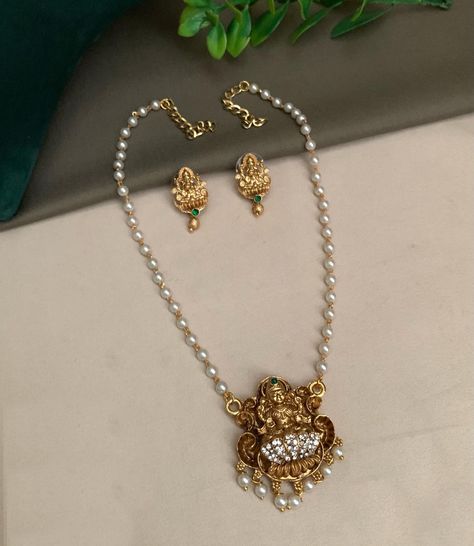 griiham__jewels . How to purchase ? . Buy now at 935/- https://www.griiham.in/products/gold-plated-elegant-pendant-set-with-pearl-mala-22150n-copy . whats up 70220 03681 . To Join Whats up Group - https://chat.whatsapp.com/KPUiahwylYm9QdgMtP49jk . Link posted in our bio/ kindly dm for link . For More Collections - www.griiham.in #jewellery #pearls #pendent #necklace Pearl Mala, Gold Pendent, Pretty Jewelry Necklaces, Necklace With Pendant, Beautiful Wallpaper For Phone, Beads Chain, Beautiful Wallpaper, Pendent Necklace, Elegant Pendant