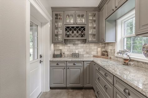 Bright and Inviting Home Bar with Mullion Front Glass Doors - Cabinets.com Gray Stained Cabinets, Maple Creek, Kitchen Cabinet Accessories, Light Grey Kitchens, Grand Kitchen, Cheap Kitchen Cabinets, Classic White Kitchen, Black Countertops, Shaker Kitchen Cabinets