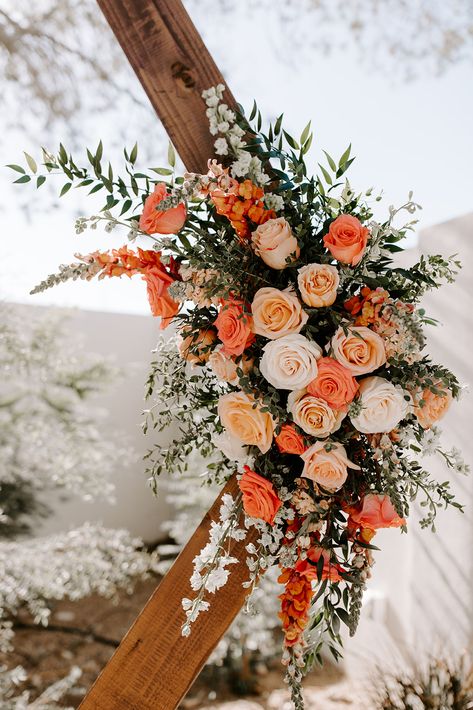 Hexagon wedding ceremony arch with coral florals and greenery (Venue: @terceroweddings // Design: @azflowerfix) #coral #wedding #peonies #roses #outdoorwedding #azwedding Coral Flower Bouquet Wedding, Coral And Terracotta Wedding, Wedding Flowers Design, Peach Arbor Flowers, Wedding Arch Orange Flowers, Hexagon Wedding Arch Terracotta, Archway Wedding Flowers, Trending Wedding Flowers 2023, Wedding Arch Orange