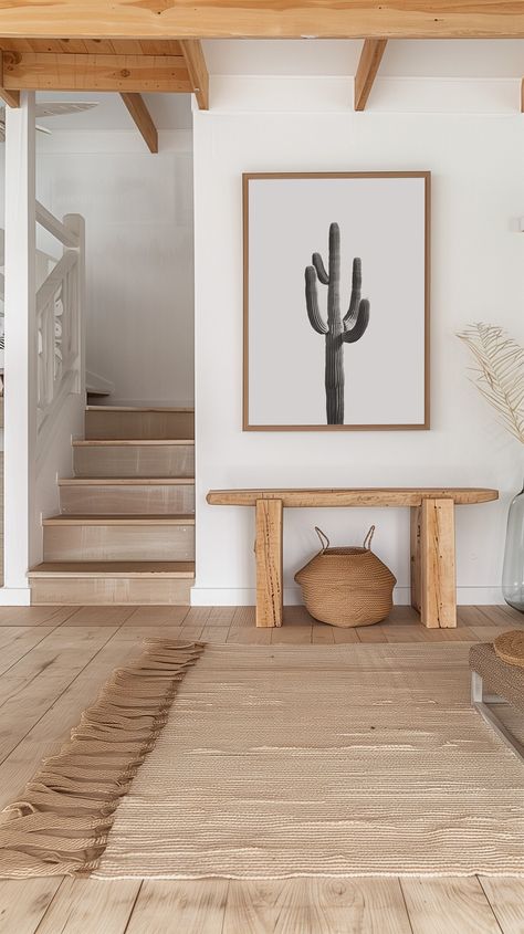 Bring the serene beauty of the desert into your home with this minimalist black and white cactus print. This striking photograph captures the elegant form of a tall cactus set against a clean white background, making it a perfect addition to any modern or minimalist decor. Ideal for living rooms, bedrooms, or office spaces, this art piece adds a touch of nature and tranquility to your space. Available in various sizes, this print is ready to frame and display. Elevate your home decor with this t Desert Prints Wall Art, Desert Chic Home, Desert Theme Interior Design, Desert Coastal Decor, Modern Southwest Entryway, Modern Western Entryway, Desert House Interior Design, Scandinavian Western Interior, Modern Desert Interior