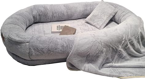 【Larged Size】Our BunniBed Human Dog Bed is inspired by the cozy dog beds for large dogs to build a cozy space for humans. It could easily fit 1-2 adults or 2-3 giant dogs with its overall size as 70" x 38" x 12". Enough space to play games or cuddle. It also comes with a straping bag to help with storing and transport. Dog Bed For People, Giant Dog Beds, Durable Dog Bed, Human Dog Bed, Human Dog, Pillow And Blanket, Sofa Bed Furniture, Plush Dog Bed, Cat Couch