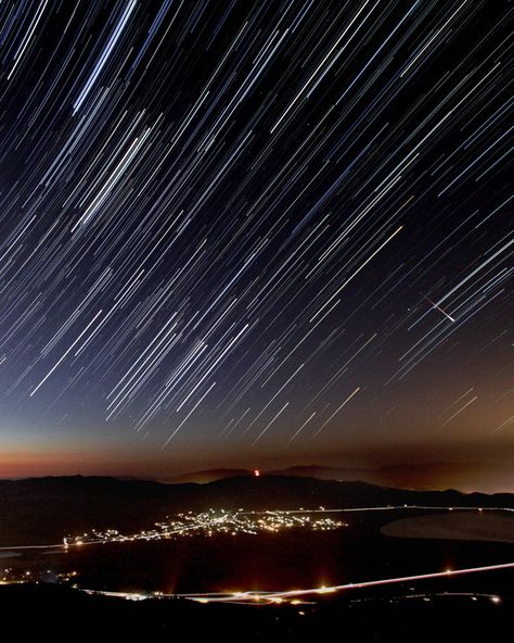 Night sky watcher William Berry sent in a photo of a Perseid meteor at Slide Mountain over Washoe Valley, NV. He says the image is a wide angle stack of about 1 hour, 30 second exposures, and he brightened the meteor trail a bit. Art About Music, Art About Love, Hujan Meteor, Perseid Meteor Shower, Star Trails, Meteor Shower, Night Sky Photos, Space And Astronomy, Amazing Photos