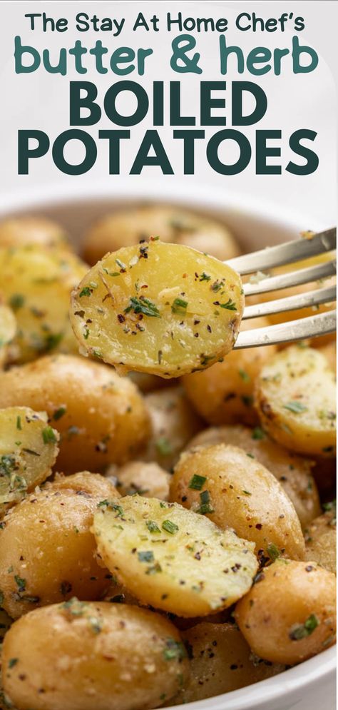 A fork lifting a potato from a bowl of boiled potatoes with butter and herbs. Boiled Then Baked Potatoes, Best Boiled Potatoes, Boiled Baked Potatoes, Boiled Fingerling Potatoes, Petite Fingerling Potato Recipes, Boiled Mini Potato Recipe, Boiled Potatoes And Carrots, Boiled Small Potatoes Recipe, Steamed Potatoes Recipes