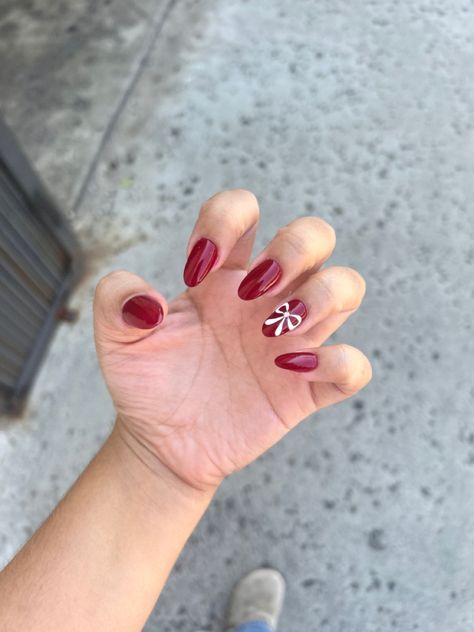 Red Chrome Nails With Bow, Red Bow Nail Art, Dark Red Bow Nails, Dark Red Nails With Bow, Red Nails With Bow Design, Red Nails With White Bow, Christmas Nail Aesthetic, Dark Red Nails Christmas, Dark Red Heart Nails