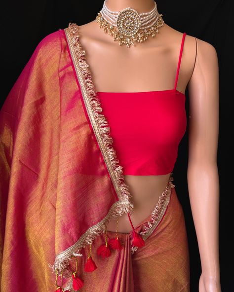 Pink gold tissue saree with contrast golden lace all over sarees. Comes with beautiful red thread tassels on pallu. Blouse: running blouse 80cm. To find this product in website: Www.thejacouture.in > Tissue sarees> pink Gold tissue saree. Jewellery collaboration: @anvi__jewellery #mettalictissuesaree #tissuesaree #trendingsaree #tissuelacesaree #traditional #pinktissuesaree Gold Tissue Saree, Tissue Sarees, Thread Tassels, Saree Jewellery, Lace Saree, Golden Lace, Tissue Saree, Red Thread, Pink Gold