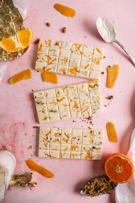 These white orange chocolate bars with pistachios are just what you need if you have extra orange peels. They’re easy to make, and the best part is that they’re gluten-free! I love how this recipe… The post How to Make Homemade Orange White Chocolate Bars appeared first on The Glutenless Maximus. Orange Bakery, Seashell Chocolates, Charcuterie Business, White Chocolate Bars, White Chocolate Syrup, Chocolate Bar Recipe, Halloween Candies, Dreamy Desserts, White Chocolate Bark