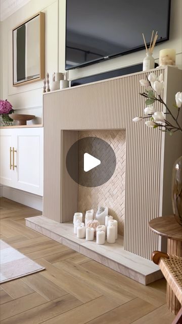 Kerry Kellett on Instagram: "I finally got round to creating that dream fluted fireplace  I had planned over a year ago 🤍✨  Panels from @panelsbysofia  Tiles from @bandq_uk  Paint is a mix of white 03 and beige 02 @lick   #fireplace #fireplaces #fireplace🔥 #fireplacedecor #fireplacemakeover #fireplacedesign #fireplacemantel #flutedfireplace #homediy #homediyproject #diyprojects #homeinterior #modernhomedesign" Diy Fluted Fireplace Surround, Fireplace Tv Wall High Ceiling, Diy Fluted Fireplace, New Fireplace Ideas, Ribbed Fireplace, Neutral Living Room With Fireplace, Chimney Breast Ideas No Fireplace, Panelling Fireplace, Fluted Fireplace Surround