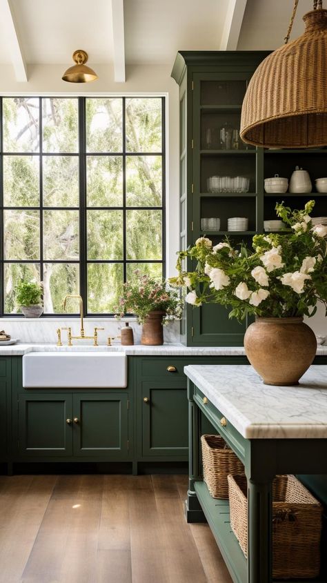 Dark green kitchens have surged in popularity. Homeowners and interior designers are absolutely swooning over their timeless charm and versatility. Dark green hues, ranging from deep forest greens to rich emeralds, add a touch of glamour and depth to kitchen designs, creating a space that feels both inviting and elegant.. #kitcheninspo #homedecor #kitchendesign #kitchenremodel Green Kitchen Black Hardware, Emerald Green House Interior Design, Green Kitchen Moodboard, Dark Green Cabinets Kitchen, Studio Green Kitchen, Green Kitchen Cabinet Colors, Green Cabinet Kitchen, Green Lower Cabinets, Kitchen Island Dark