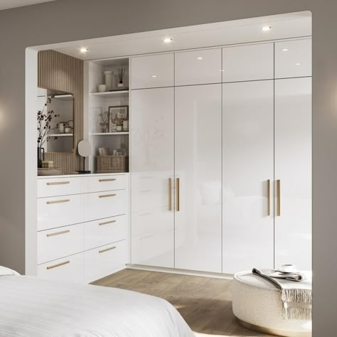 Hockley mirror gloss white bedroom from Howdens. Simple and sleek style. Modern slab design. High-quality finish. Professional and local design expertise. White Fitted Wardrobes, White Wardrobe Bedroom, Fitted Wardrobe Ideas, Howdens Hockley, Glass Wardrobe Design, Closet Design Plans, Dressing Table Ideas, Fitted Wardrobes Bedroom, Fitted Wardrobe