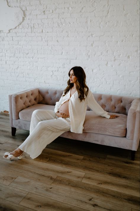 Sofa Maternity Shoot, Maternity Poses On Couch, Maternity Pajama Photoshoot, Lounge Wear Maternity Shoot, Maternity Shoot On Couch, Maternity Pictures On Couch, Winter Studio Maternity Photoshoot, Winter Maternity Photoshoot Indoor, Jeans And White Button Up Maternity Shoot