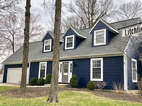 We like the view from out here. Mindy (@missminnicole on Instagram) was looking for an exterior color that gave her home a bold look. Can you guess what she went with? Our 2020 Color of the Year! Visit your neighborhood Sherwin-Williams to see Naval SW 6244 in person. #exteriorpaintcolors #sherwinwilliams #bluehouseexterior Hale Navy Exterior Color Scheme, Salty Dog Sherwin Williams Exterior, Dark Blue Exterior House, Sw Naval, Dark Blue Exterior, Blue Exterior House Colors, Dark Blue House Exterior, Navy Blue Houses, Dark Blue Houses