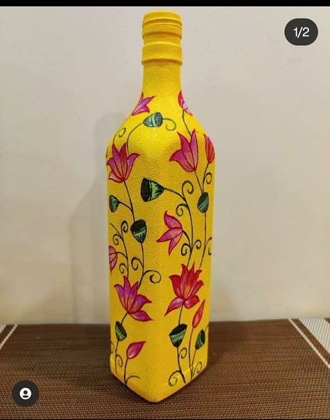 Hand-painted recycled wine bottle Bottle Art Projects, Dot Designs, Painted Glass Bottles, Indian Handicrafts, Hand Painted Bottles, Painted Pots Diy, Glass Bottle Diy, Glass Painting Designs, Diy Glass Bottle Crafts