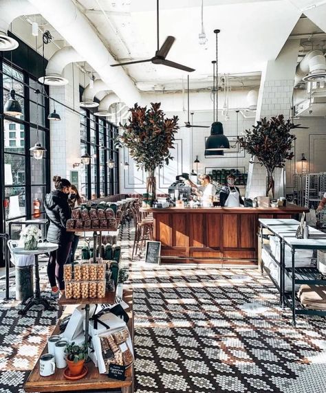 The 23 Most Beautifully Designed Modern Coffee Shops | Architectural Digest | Architectural Digest Cafe Design Interior, Tatte Bakery, Modern Coffee Shop, Coffee Shops Interior, Book Cafe, Coffee Shop Design, Coffee Shop Decor, Bakery Cafe, We Are Open